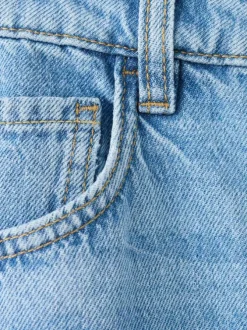 Jean en coton bleu stone délavé avec une coupe bootcut et 5 poches