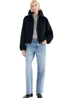 Jean en coton bleu stone délavé avec une coupe bootcut et 5 poches