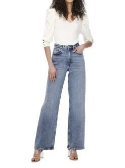 Jean en coton bleu stone délavé avec une coupe bootcut et une taille haute