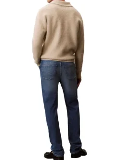 Jean en coton bleu uni avec une coupe droite à zip et à bouton