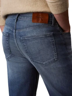 Jean en coton bleu uni avec une coupe droite à zip et à bouton