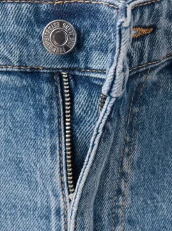 Jean 7/8 en coton bleu uni avec une coupe mom et une taille haute