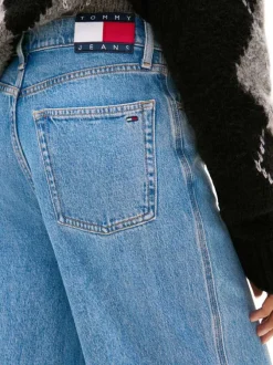 Jean en coton bleu uni avec une coupe wide leg à zip et à bouton
