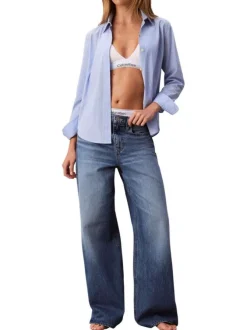 Jean en coton bleu uni avec une coupe wide leg à zip et bouton