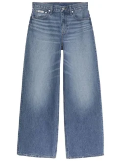 Jean en coton bleu uni avec une coupe wide leg à zip et bouton