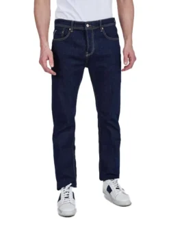 Jean en coton brut avec une coupe ajustée et des passants pour la ceinture