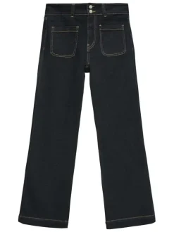 Jean en coton brut uni avec une coupe bootcut et poches plaquées