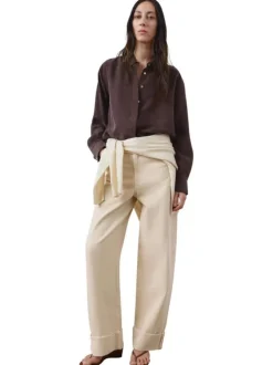 Jean en coton écru uni pourvu d'une taille haute et d'une coupe bootcut