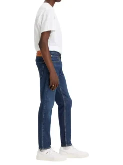 Jean 512 en coton indigo délavé avec une coupe slim et à 5 poches