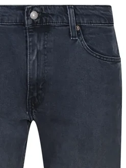 Jean 511 en coton indigo délavé style 5 poches avec une coupe slim