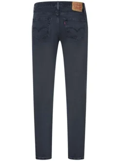 Jean 511 en coton indigo délavé style 5 poches avec une coupe slim