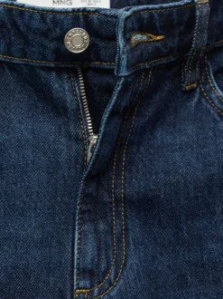 Jean en coton indigo légèrement délavé avec une coupe bootcut