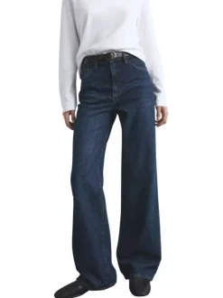 Jean en coton indigo légèrement délavé avec une coupe bootcut