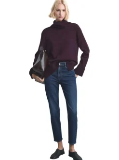 Jean 7/8 en coton indigo uni avec une coupe mom et une taille haute