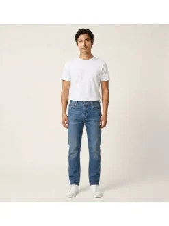 Jean en coton indigo uni avec une coupe slim et une fermeture par zip et bouton