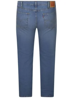 Jean en coton indigo uni avec une coupe slim et une fermeture par zip et bouton