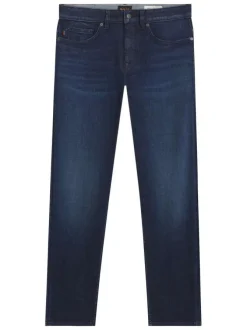 Jean en coton indigo uni avec une coupe slim à zip et bouton