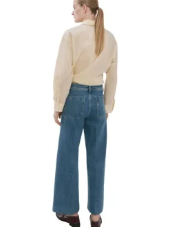Jean en coton indigo uni pourvu de passants pour la ceinture