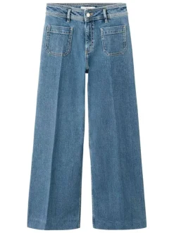 Jean en coton indigo uni pourvu de passants pour la ceinture