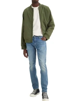 Jean 512® en coton mélangé bleu à coupe slim pourvu de coutures contrastées