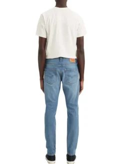 Jean 512® en coton mélangé bleu à coupe slim pourvu de coutures contrastées