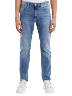 Jean en coton mélangé bleu délavé avec une coupe slim et à 5 poches