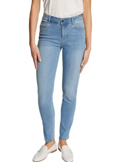 Jean en coton mélangé bleu délavé avec une coupe slim et surpiqûres beiges