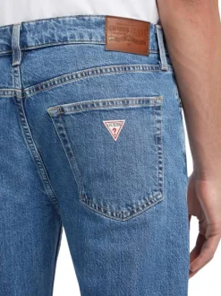 Jean en coton mélangé bleu indigo uni avec une coupe regular fit