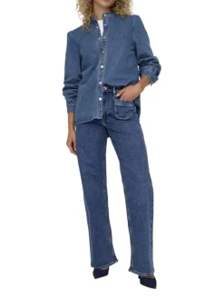 Jean en coton mélangé bleu indigo uni à coupe bootcut avec des poches plaquées