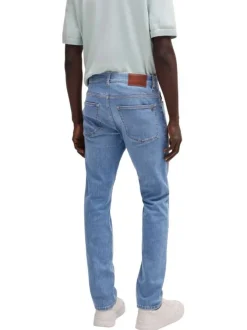 Jean en coton mélangé bleu légèrement délavé à coupe regular fit