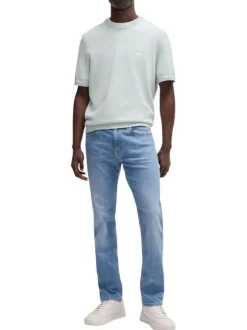 Jean en coton mélangé bleu légèrement délavé à coupe regular fit