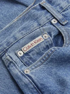 Jean en coton mélangé bleu uni avec une coupe droite et une taille haute