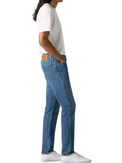 Jean 512 en coton mélangé bleu uni avec une coupe slim et des passants