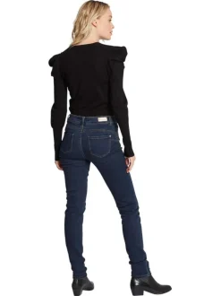 Jean en coton mélangé brut avec une coupe skinny et des passants
