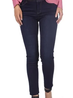 Jean en coton mélangé brut avec une coupe skinny et des passants
