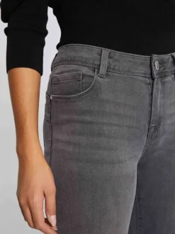 Jean en coton mélangé gris avec une coupe skinny et des passants