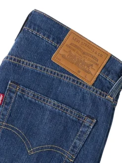 Jean 512® en coton mélangé indigo à coupe slim pourvu de coutures contrastées