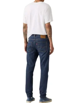 Jean 512® en coton mélangé indigo à coupe slim pourvu de coutures contrastées