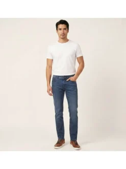 Jean en coton mélangé indigo uni pourvu d'une coupe slim et de multiples poches