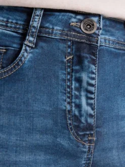 Jean en coton mélangé indigo uni pourvu d'une coupe slim et d'une taille haute