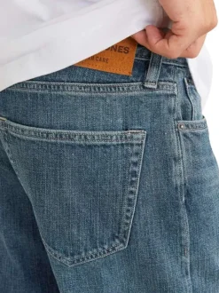Jean en coton mélangé stone uni avec une coupe droite et des passants