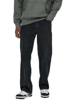 Jean en coton noir légèrement délavé avec une coupe baggy et des passants