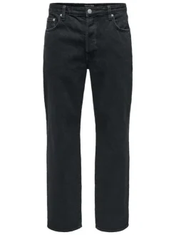 Jean en coton noir légèrement délavé avec une coupe baggy et des passants