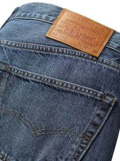 Jean 565 en coton noir uni avec une coupe ample et une taille mi-haute