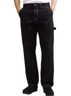 Jean en coton noir uni avec une coupe droite et des surpiqûres blanches