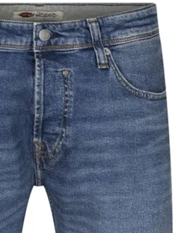 Jean en coton stone uni à coupe regular fit fermé par une braguette à boutons