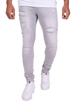 Jean gris clair en coton effet usé coupe skinny