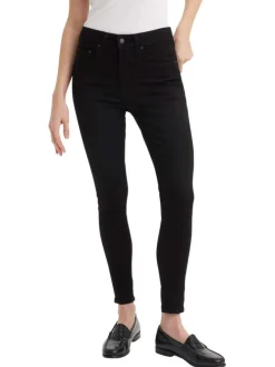 Jean 721 High Rise Skinny en coton mélangé noir uni avec une coupe skinny