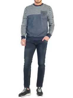 Jean 700/11 Jogg en coton indigo uni avec une coupe slim et des poches plaquées à l'arrière