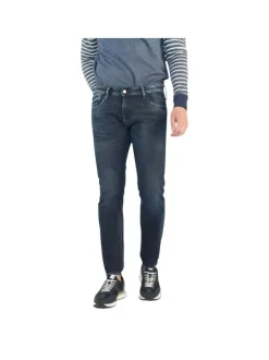 Jean 700/11 Jogg en coton indigo uni avec une coupe slim et des poches plaquées à l'arrière